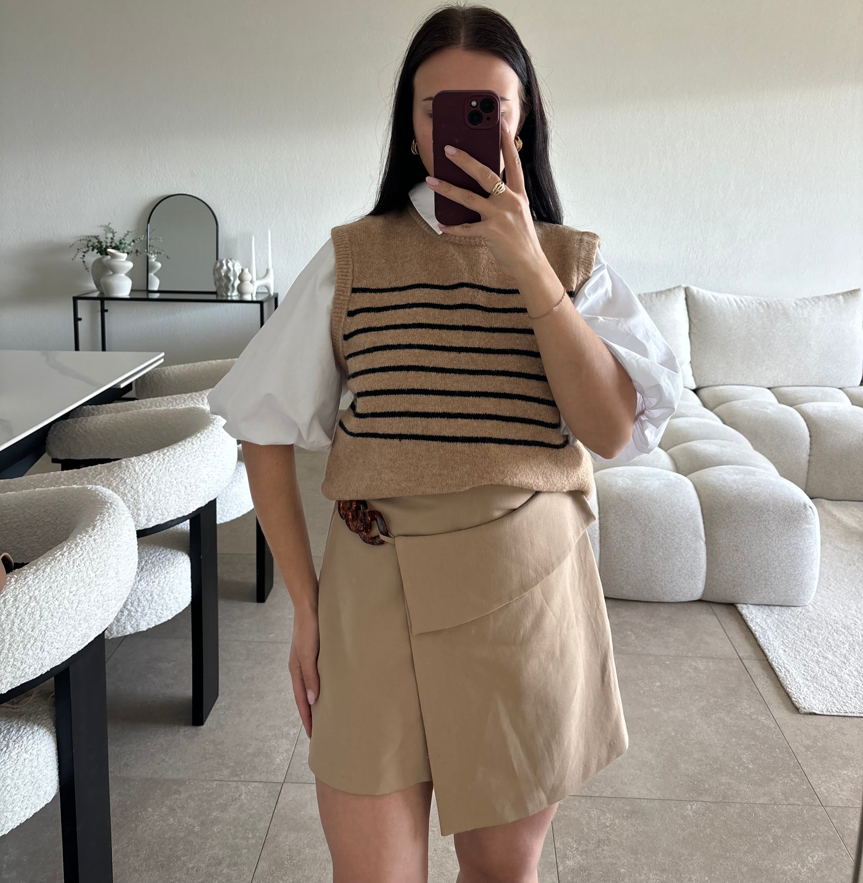 Pull rayé sans manches taille S/M