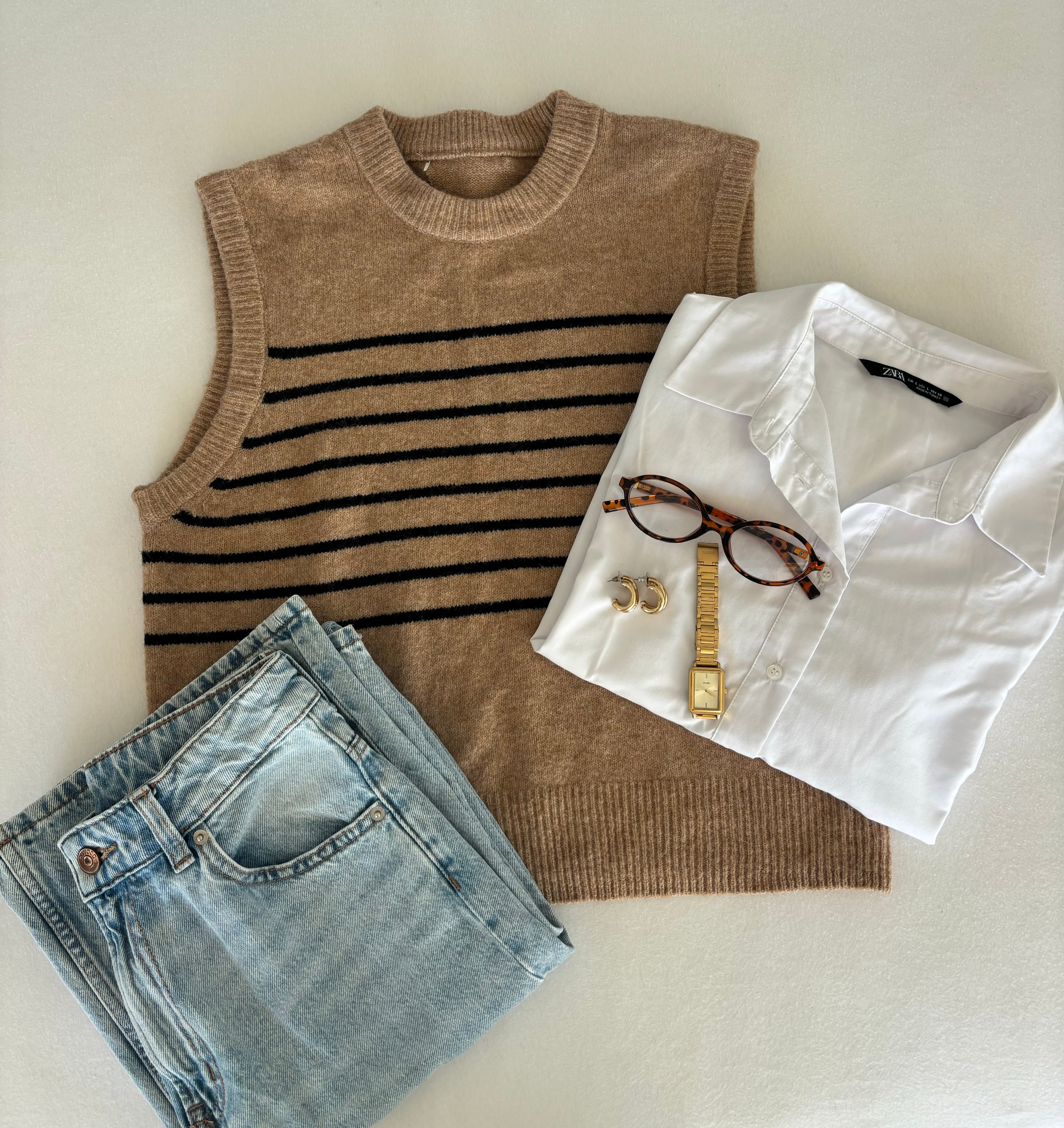 Pull rayé sans manches taille S/M